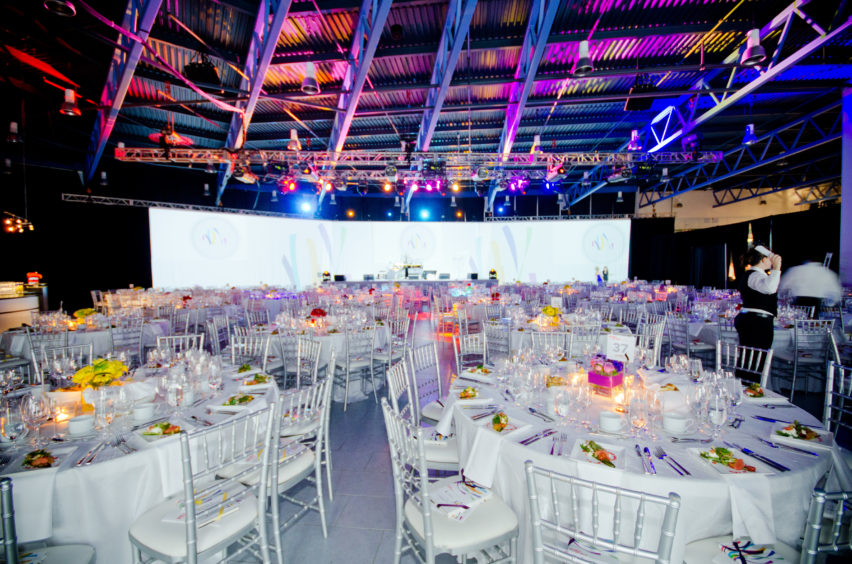 Hala Events - Renew The World Gala dining space and stage